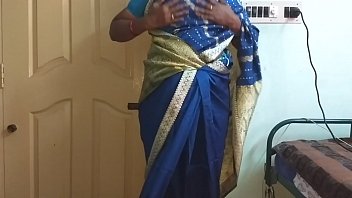 Tamil Temptress In A Tantalizing Blue Saree Reveals Her Shaved Treasure And Bountiful Bosom, Teasing Her Nipples And Rubbing Her Wetness Raw.