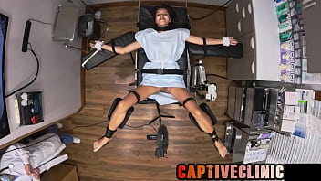 Innocent Aria Nicole, Captured By The Sinister Good Samaritan Health Labs, Is Delivered To Doctor Tampa’s Twisted Clinic For Relentless, Kinky Medical Experiments At The Bondageclinic.