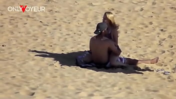 Secret Seaside Show: Young Lovers’ Risky Beach Tryst