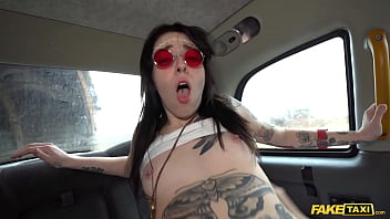 Hippie Hitchhiker Rides A Massive Cock In The Back Of A Phony Cab.