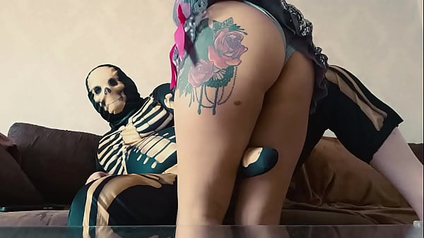 Sultry Skeleton Seduces Curvy Beauty
