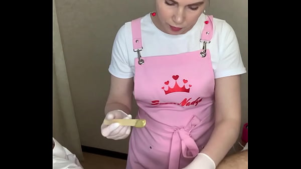 Russian Depilation Queen Sugarnadya Strips Down To Show You Exactly How To Wax A Man’s Deep Bikini Area And His Hard Cock