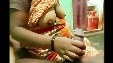 Indian Aunty’s Hand Sliding On A Young Boy’s Hard Cock